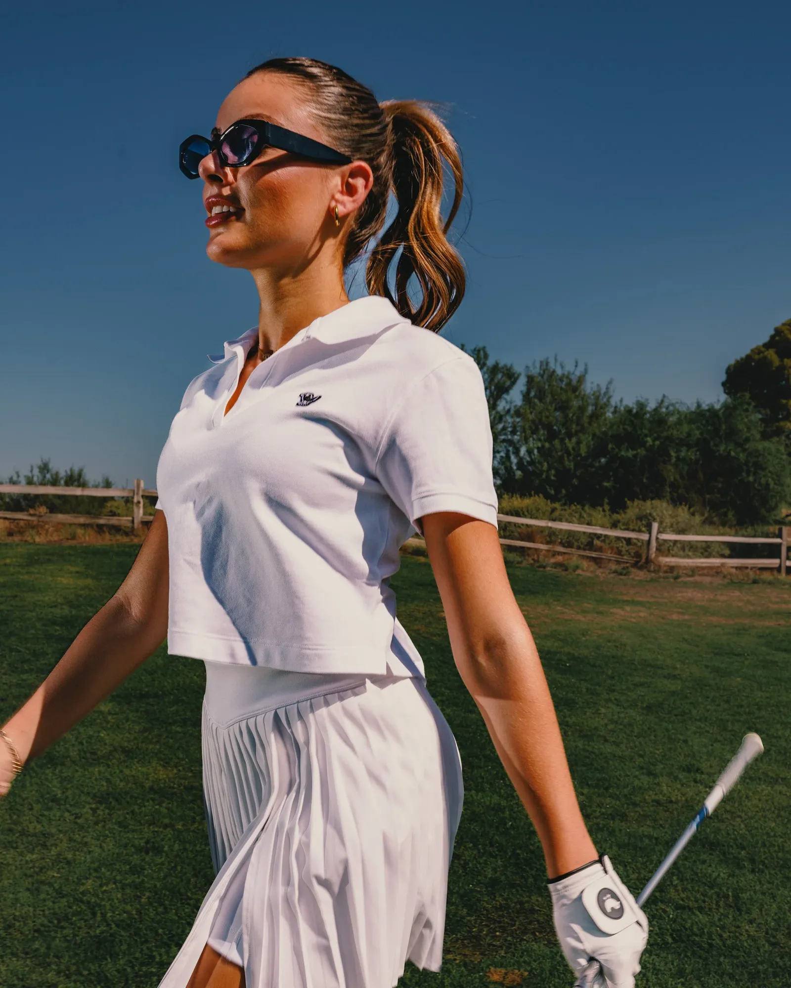 The White Rib Collar Women's Polo: A Style Staple for the Course